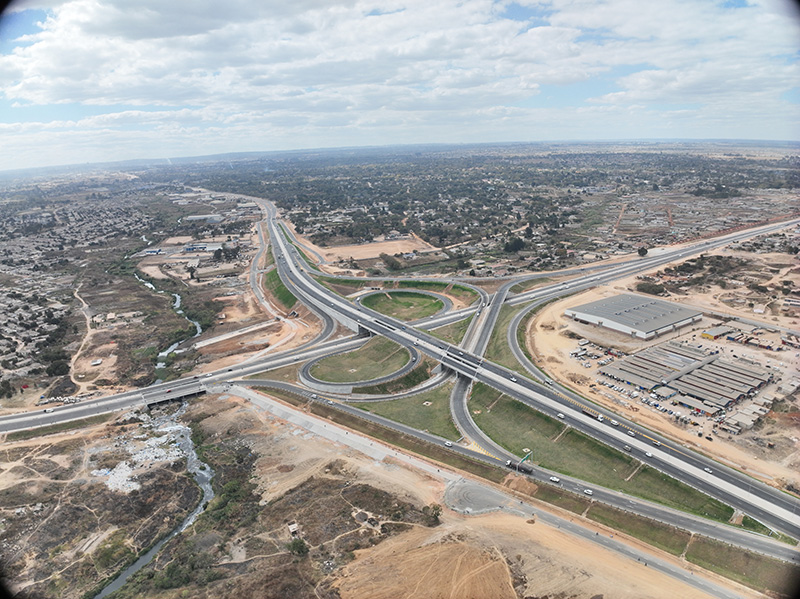 Aerial view of the Mbudzi Interchange in Harare, a multi level freeway interchange engineered by DNMZ International.